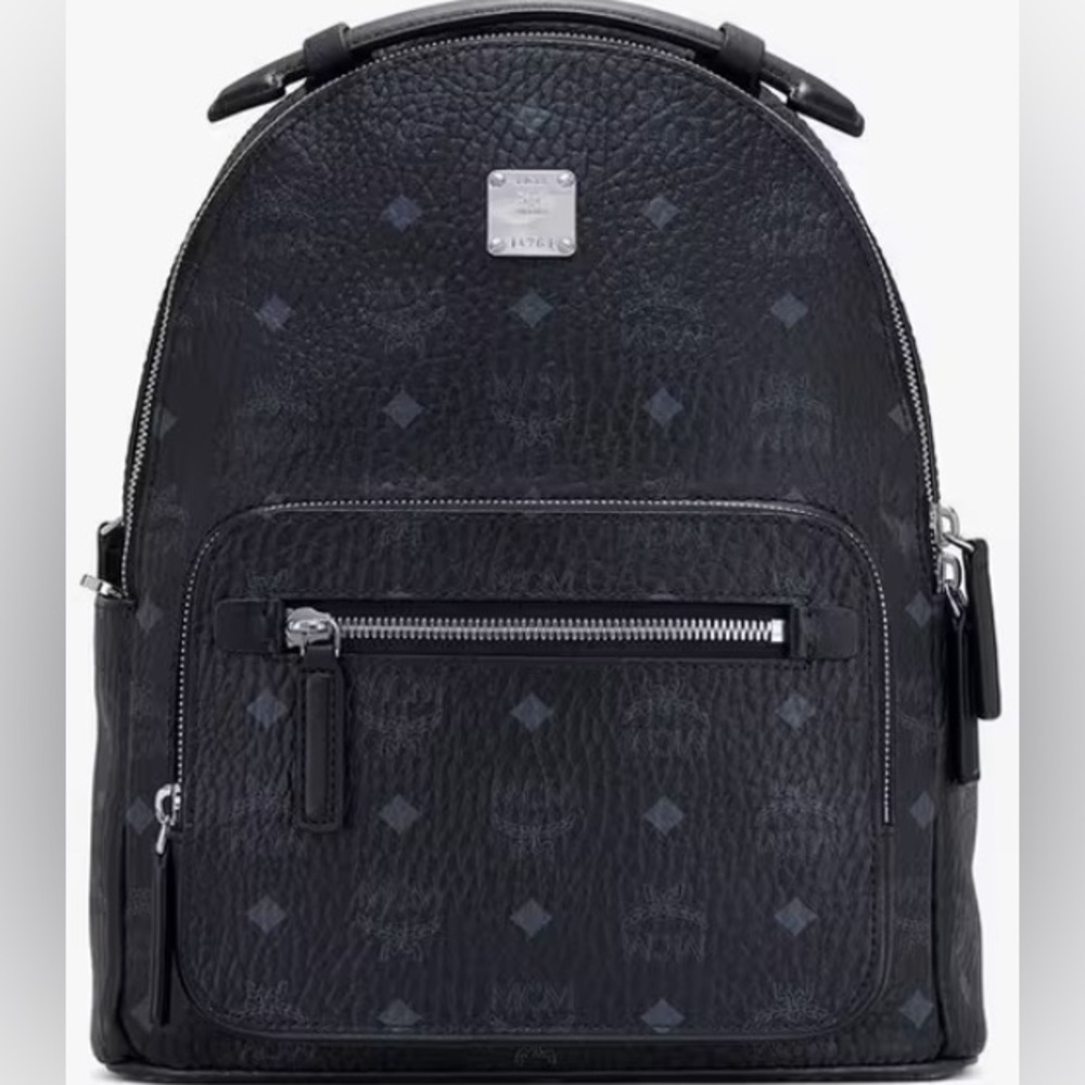 MCM medium Spark Backpack, NWOT. Adjustable padded, shoulder straps, w/dust bag.